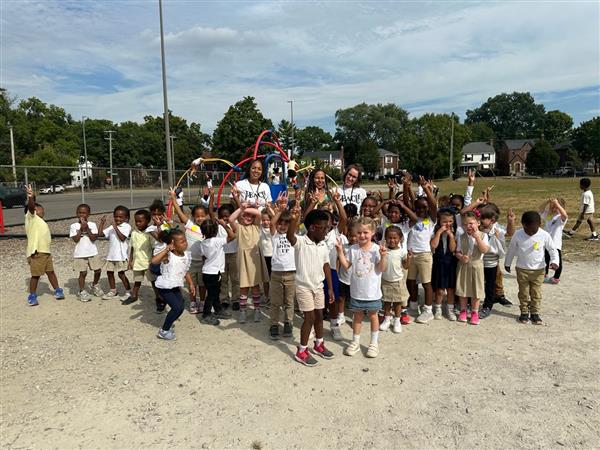 Students gather on playground for peace day